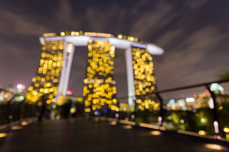 Abstract bokeh of light on building and moving cloudのeditorial素材