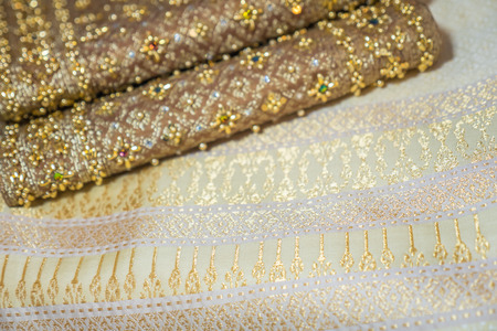 Thai silk fabric beautiful textured backgroundの写真素材