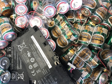 unused laptop computer batteries and pack of big size batteries which are preparing for recycle or properly destroyのeditorial素材
