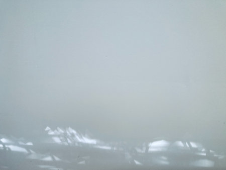 beautiful rays of sunshine at the bottom of the white cement wall in natural daylight, using for...