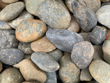 group of big natural brown and gray color rocks in natural daylight, using as backgroundの写真素材