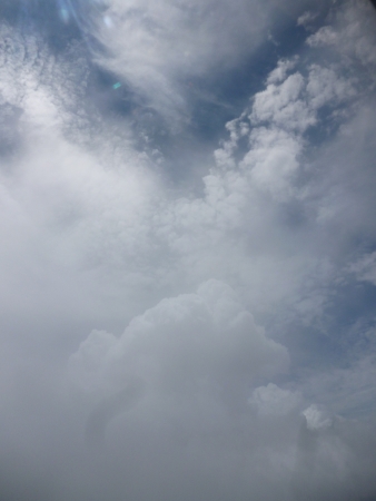         The sky in the afternoon from Bangkok to Krabi  This is the first flight in my life  I feel i am near heaven when i see through clouds in the sky  の写真素材