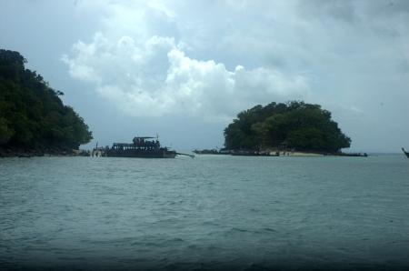 Go with Long-tailed boat in Krabi sea in cloudy day  It have some rain の写真素材