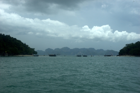 Go with Long-tailed boat in Krabi sea in cloudy day  It have some rain の写真素材