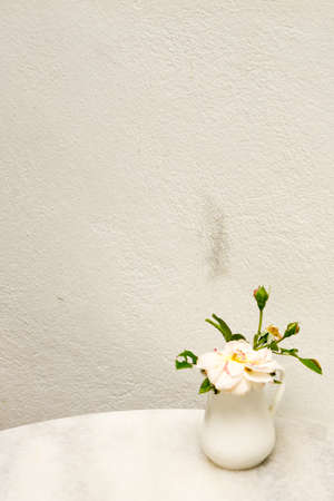 Dirty on the floor with decorated flower vaseの写真素材