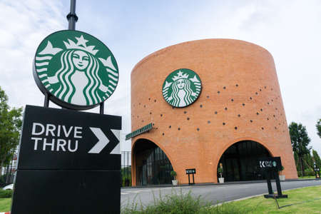 Ayutthaya Province, Thailand - September 25, 2014 : the Starbucks drive thru at 200th store at FastFac Mini Factory one of the fastest growing industrialのeditorial素材
