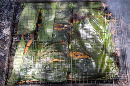 Thai steamed sticky rice wrapped in banana leaf, Thai street foodの写真素材