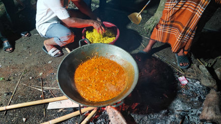 Pilaf cooking on the fire at the temple in Thailand.の写真素材