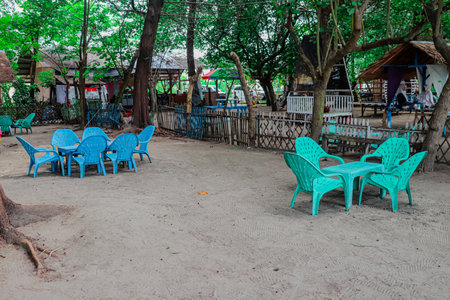 Tables and chairs in the public park,Thailand,Asiaの写真素材