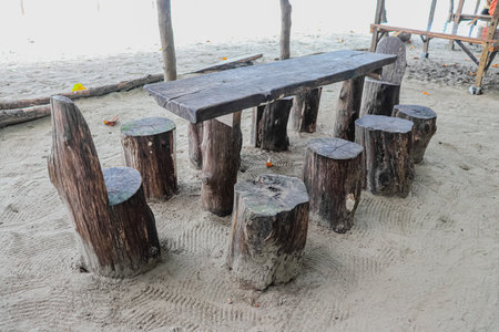 Wooden table and chair on the beach of Koh Samui, Thailandの写真素材