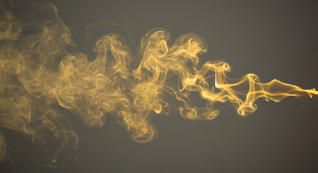 Yellow smoke on a black background. Abstract background. Design element.の素材