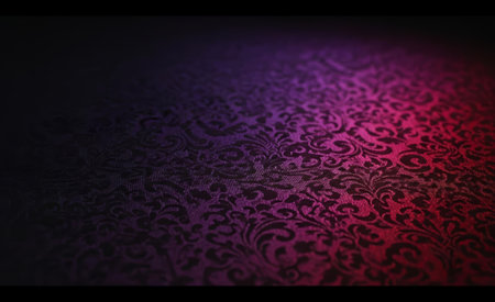 Textured dark fabric features an elegant damask pattern, highlighted by a glowing gradient of purple and red light for a luxurious feelの素材