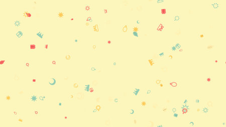 Colorful pieces scattered on a soft yellow surface, creating a festive atmosphere.