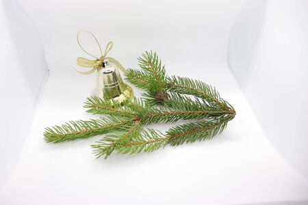 spruce twig and a golden bell, New Year holidaysの写真素材