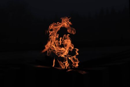 eternal flame, flame in the dark, light in the darkの写真素材