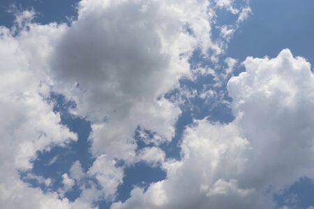cloudy sky, many white cloudsの写真素材