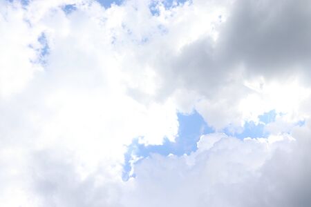 cloudy sky, many white cloudsの写真素材