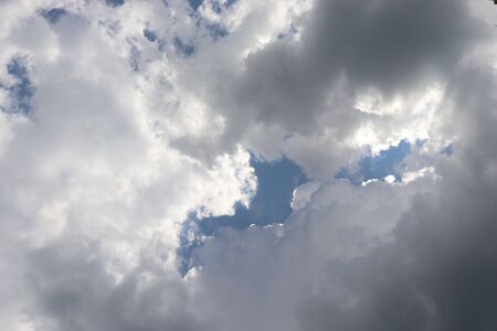 cloudy sky, many white cloudsの写真素材