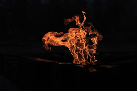eternal flame, flame in the dark, light in the darkの写真素材