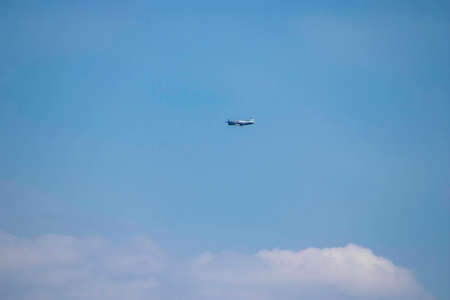 helicopter in blue summer sky by day, air transport