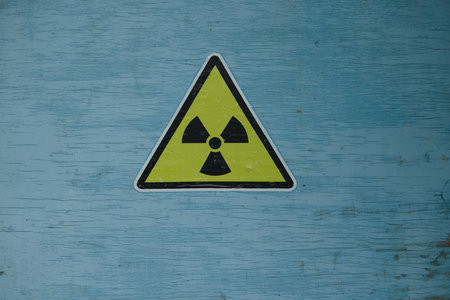 on blue door radiation icon on yellow backgroundの写真素材