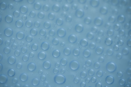 Water drops on blue background. Water drops on blue background. Water drops textureの写真素材
