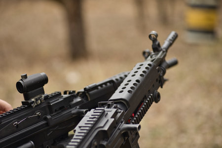airsoft replica weapon, machine gun on a natural background