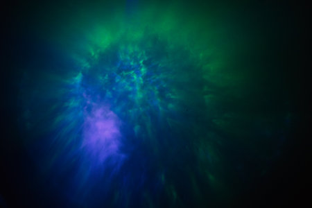 A mesmerizing abstract image featuring a glowing interplay of purple and red hues. The soft,...