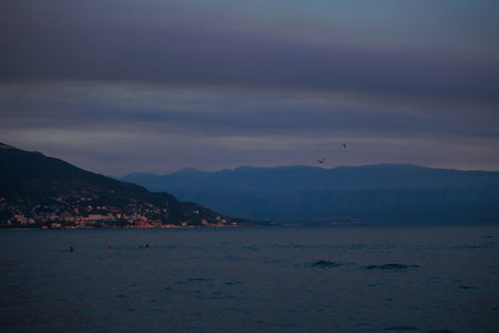 Golden Sunset Reflections on the Shore in Budva, Montenegro â August 26, 2025の写真素材