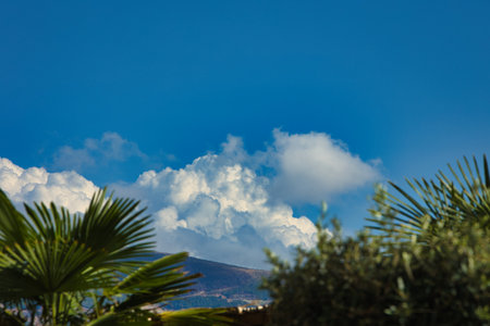 Summer holiday in the mountains, fluffy fairytale clouds over the mountains in Vlore, Albania - August 23, 2025の写真素材
