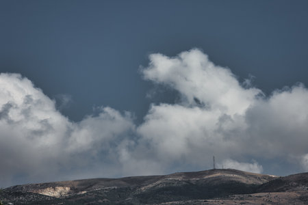 Summer holiday in the mountains, fluffy fairytale clouds over the mountains - August 23, 2025の写真素材