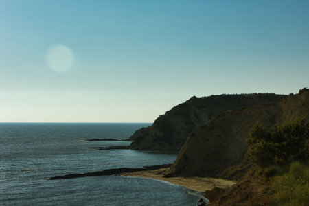 Coastal landscape in Vlora, Albania, captured on August 25, 2025. The scene shows rugged seaside...