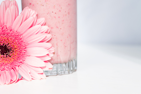 Berry Smoothies with a Fower on a White Backgroundの写真素材