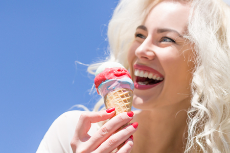 Young Girl with Ice Cream. Copy Spaceの写真素材