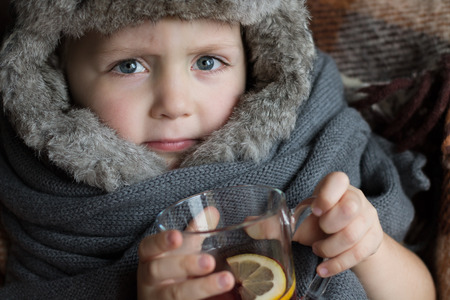 Portrait of a Sick Child. Winter Conceptの写真素材