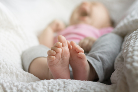 A Small Child Wakes Up in the Sunlightの写真素材