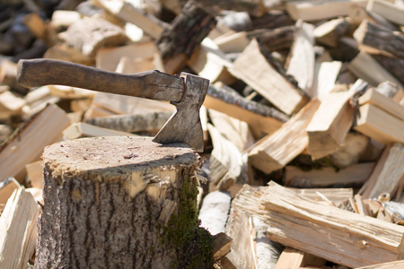 Old Hatchet with Firewood. Wood. Copy spaceの写真素材