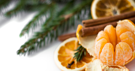 Mandarin With Cinnamon on the Christmas Tree Background. Copy Space. Backgroundの写真素材