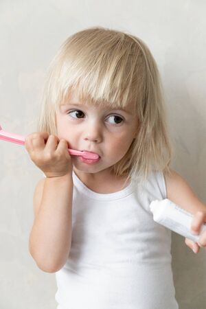 Little Girl Brushes Teeth With Toothbrush. Dentistry Health. In Isolation