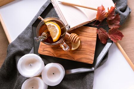 Autumn Still Life with Tea with Lemon and Honey. Diary for Records. Flat Lay