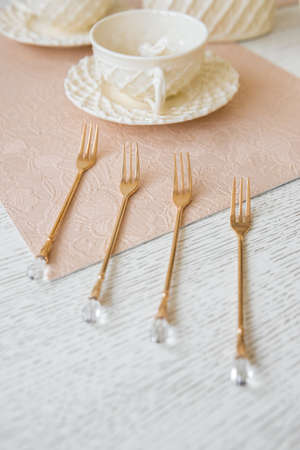 Set of Dessert Forks on Table. Copy Space