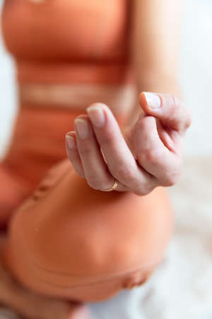Slim Woman Stretching in Brown Sportswear. Copy Spaceの写真素材