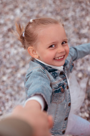 Cute Little Girl in a White Dressの写真素材