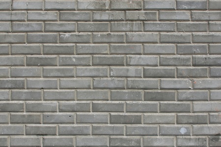 Close up of vintage bricks formed from concrete which were used to create a nice wall の写真素材