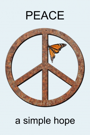 Rusted metal peace symbol with monarch butterfly attached and the words Peace a Simple Hope.の写真素材