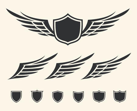Vector set of isolated winged crests over white background のイラスト素材