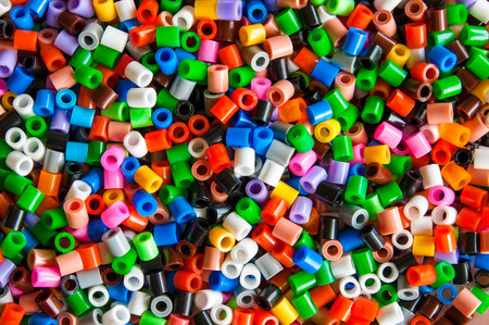 multicolored plastic hama beads toy for kidsの写真素材