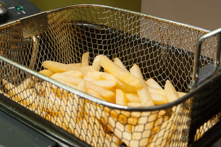 French fries fried in oil golden patatoの写真素材