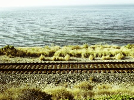 Coastal rail trail and a beautiful pacific ocean as a background.の写真素材