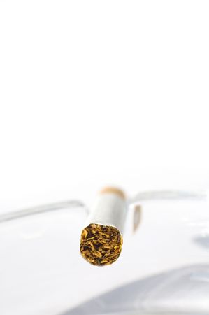Cigarette in ash trayの写真素材